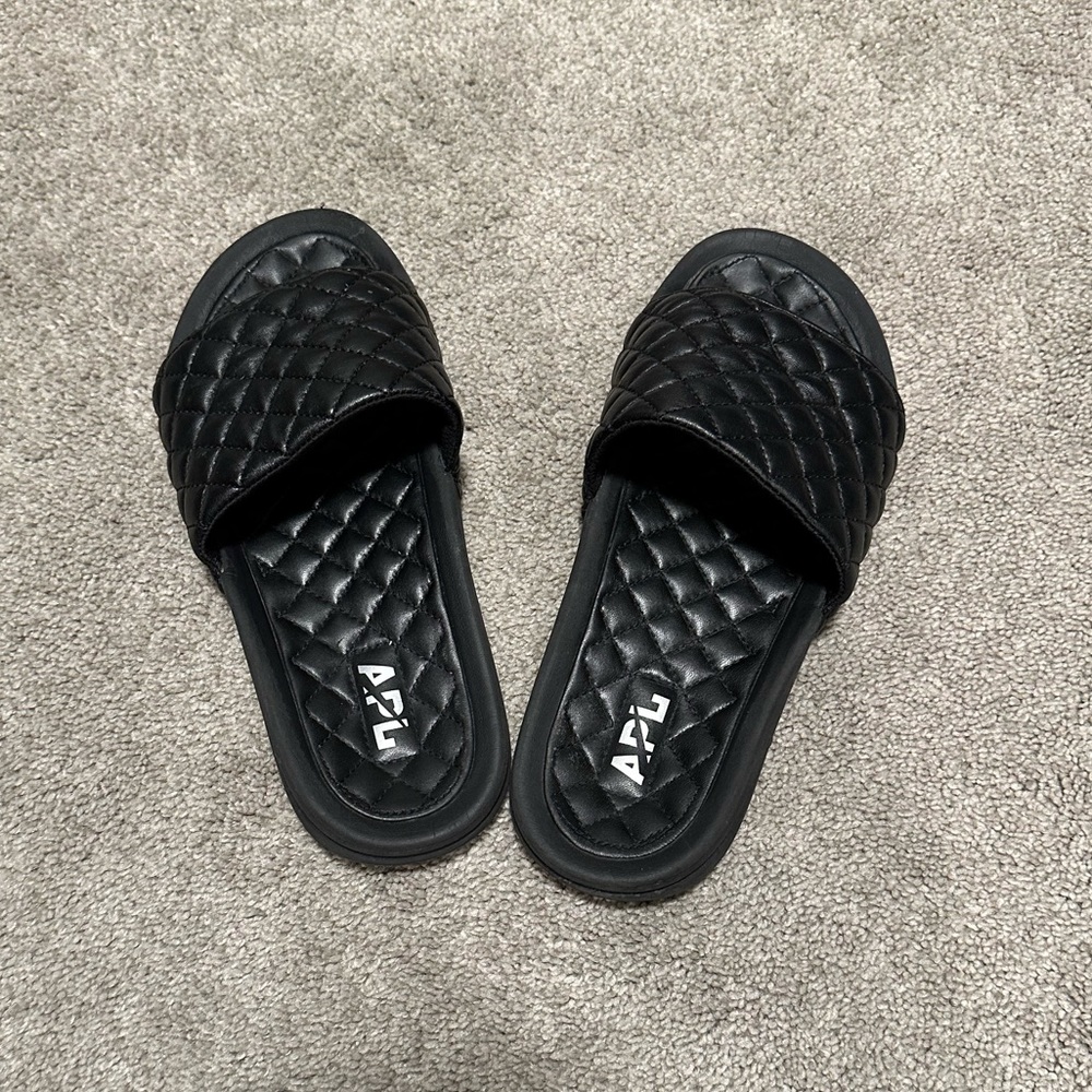 APL black leather slides
